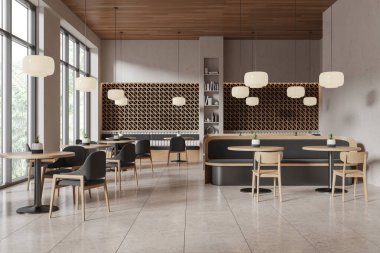 Modern kafenin içi hafif ahşap mobilyalar, geometrik duvar tasarımı, ahşap tavanın altında kolye ışıkları ve parlak bir pencere zeminiyle. Tarz sahibi bir ortam. 3B Hazırlama.