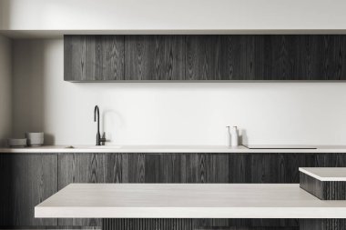 Minimalist mutfak tasarımı karanlık ahşap dolaplar, aydınlık tezgahlar ve tarafsız bir arka planda modern musluk sergiliyor. Modern iç mekan kavramı. 3B Hazırlama.