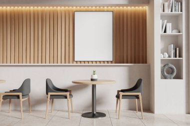 Minimalist kafe alanı, ahşap paneller, çağdaş sandalyeler, küçük bir bitkiyle yuvarlak masa, ve parlak bir ortamda boş bir dikey çerçeve tasarımı. 3B Hazırlama.