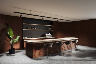 Pürüzsüz bir adası, ahşap yüzeyleri, modern bar tabureleri ve yeşil bir saksı bitkisiyle tamamlanmış açık rafları olan minimalist bir mutfak. Ilık ışıklandırma. 3B Hazırlama.