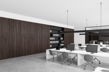 Temiz beyaz masalar, gri sandalyeler, bilgisayarlar, ahşap duvar panelleri ve raflardan oluşan modern ofis içi. Minimalist tasarımla açık alan kavramı. 3B Hazırlama.