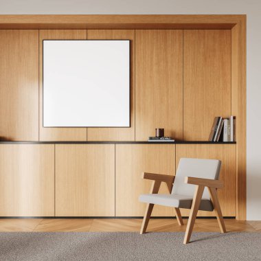 Konforlu modern iç mekanda tahta duvarda boş bir poster, hafif ahşap paneller, rahat bir koltuk, ve kitaplar, minimalist tasarım konsepti. 3B Hazırlama.
