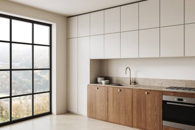 Doğal ahşap dolapları, parlak beyaz dolapları ve doğaya bakan geniş bir penceresi olan modern bir mutfak. Minimalist ev tasarımı konsepti. 3B Hazırlama.