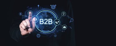 Karanlık bir zemin üzerinde teknoloji ve ağ simgeleriyle çevrili parlayan B2B dijital arayüzü ile el etkileşimi. İş hizmetleri kavramı