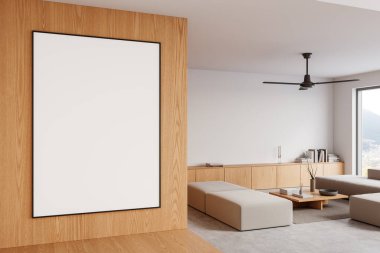 Minimalist bir oturma odasındaki ahşap bir duvarda boş çerçeveli poster. Modern mobilyalar, hafif tonlar ve rahat bir atmosfer. İç konsept. 3B Hazırlama.