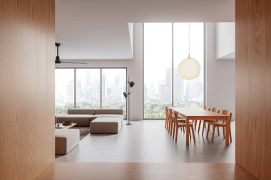 Ahşap yemek takımı, bej koltuklar ve şehir manzarasına bakan geniş pencereleri olan geniş modern bir iç mekan. Minimalist konsept, parlak tonlar. 3B Hazırlama.