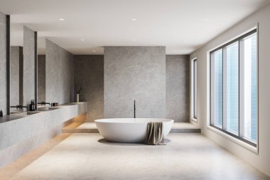 Minimalist banyo, serbest çalışan beyaz küvet, parlak beton duvarlar ve büyük pencereler. Modern tasarım konsepti. 3B Hazırlama