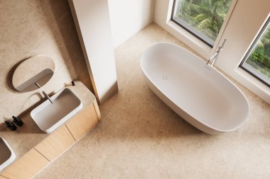 Serbest küveti, ahşap kibri ve geniş pencereleri olan minimalist bir banyo. Sıcak tonlar, doğal ışık ve modern iç tasarım konsepti. 3B Hazırlama.