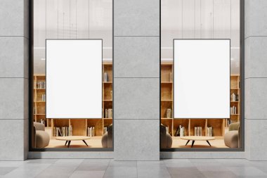 Modern bir binanın cam camlarında içinde şık bir kitapçı olan iki büyük boş poster. Markalaşma ya da reklam modelleri için mükemmel. 3B Hazırlama