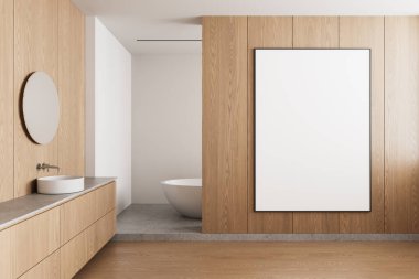 Ahşap kaplamalı minimalist banyo çerçeveli boş poster, yuvarlak ayna ve modern küvet. Nötr tonlar temiz ve zarif bir tasarımı vurgular. 3B Hazırlama.