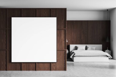 Modern tasarımı, yumuşak ışıklandırması ve nötr tonları olan karanlık ahşap duvarda büyük boş bir poster. Sunum ya da şablon için mükemmel. 3B Hazırlama.