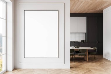 Ahşap döşemesi ve mutfak manzarası olan parlak, modern bir iç mekânda beyaz bir duvara boş bir poster çerçevesi. Yaratıcı modeller ya da şablonlar için temiz tasarım. 3B Hazırlama.