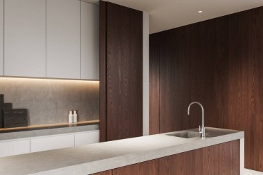 Koyu ahşap kaplamalı modern mutfak, beton tezgah ve gösterişli dolaplar. Çevre aydınlatması minimalist estetiği geliştirir. 3B Hazırlama