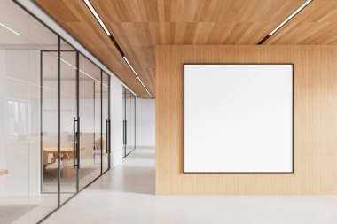 Modern ofis içindeki ahşap duvarda boş bir poster modeli var. Cam bölmeler, ahşap tavan ve minimalist dekorlar. Sunum için temiz bir düzen. 3B Hazırlama.