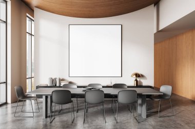 Temiz bir duvarda boş çerçeveli bir tuval, tarafsız bir ortamda şık bir masa, sandalye ve dekoratif unsurlara sahip çağdaş ofis alanı. 3B Hazırlama