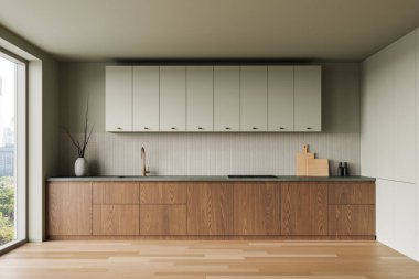 Ahşap alt dolapları, beyaz üst dolapları ve yeşilimsi gri tezgahı olan şık bir mutfak. Şehir manzaralı büyük bir pencere. 3B Hazırlama