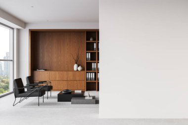 Çağdaş ofis alanı ahşap dolaplar, sandalyeler ve tasarım için büyük beyaz bir duvar içeriyor. Minimalist ve temiz bir kavram. 3B Hazırlama.