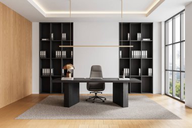Gösterişli bir masa, organize raflar ve büyük pencereler içeren çağdaş ofis içi. Sıcak ahşap elementler ve nötr tonlar modern tasarımı geliştirir. 3B Hazırlama.