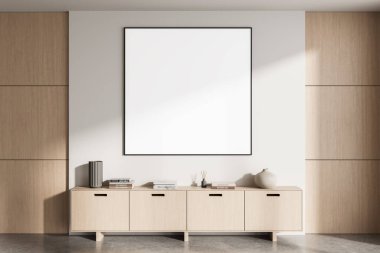 Minimalist hafif ahşap dolabın üstündeki beyaz duvarda boş poster çerçevesi, dekorasyon malzemeleriyle modern iç düzen, temiz ekran tasarımı konsepti, 3D görüntüleme