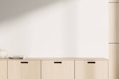 Boş beyaz bir duvara karşı hafif ahşap bir dolap, üstünde kitaplar ve vazo, parlak arka planda minimalist iç mekan tarzı, poster modeli konsepti, 3D canlandırma