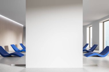 Kavisli mavi şezlonglu sandalyeli modern bir odada boş beyaz duvar modeli, minimal tasarım, beton zemin ve büyük pencereler. Poster görüntüsü kavramı. 3B Hazırlama