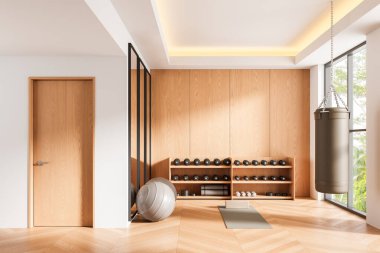Modern spor salonu ahşap duvarları, halterleri, kum torbası ve yoga minderi dahil olmak üzere spor aletleri, açık ahşap zemin, büyük pencereler, 3 boyutlu döşeme.