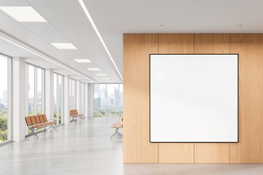 Modern lobideki ahşap duvarda boş dikey poster modeli. Büyük pencereleri, temiz tasarımı ve şehir manzaralı arka planı var. 3B Hazırlama
