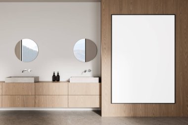 Minimalist banyo ahşap dolaplar, iki yuvarlak ayna, beton lavabo, ve ahşap duvarda boş çerçeveli büyük bir poster, temiz 3D görüntüleme