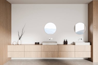 Hafif ahşap dolaplı minimalist banyo, iki yuvarlak ayna ve yumuşak beyaz arka planda ayarlanmış nötr tonlu dekor. Modern zarafet kavramı. 3B Hazırlama