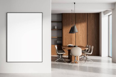 Parlak yuvarlak masa, ahşap kaplama, minimal sandalyeler ve beyaz duvarda boş dikey çerçeve. Modern çalışma alanının 3 boyutlu oluşturulması