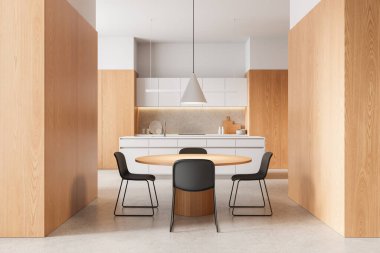Ahşap duvarları, yuvarlak yemek masası ve minimalist tarzda ve temiz arka planda modern sandalyeleri olan çağdaş bir mutfak. Modern zarafet kavramı. 3B Hazırlama