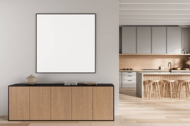 Ahşap dolabın üstündeki beyaz duvarda boş poster modeli modern temiz iç kısımda, doğal renklerde şık bir mutfağın yanında. 3B Hazırlama