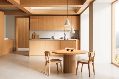 Işıl ışıl ahşap mobilyalar, yuvarlak yemek masası, kolye ışıkları ve parlak modern bir mutfak alanı olan temiz çizgiler. 3B Hazırlama