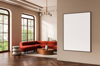 Modern oturma odasının iç tarafında kırmızı kanepe, ahşap sehpa ve büyük pencereli bej duvarda boş bir poster modeli. 3B Hazırlama