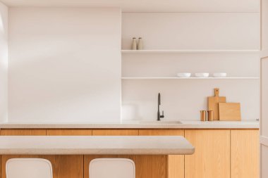 Boş bej duvarlı modern mutfak, minimalist ahşap dolaplar, nötr tonlar, poster modeli veya reklam sunumu için temiz bir düzen. 3B Hazırlama
