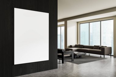 Modern oturma odasında, panoramik pencereleri, gri mobilyaları ve beton zemini olan karanlık ahşap duvarda boş dikey posterler. Tasarım kavramı. 3B Hazırlama