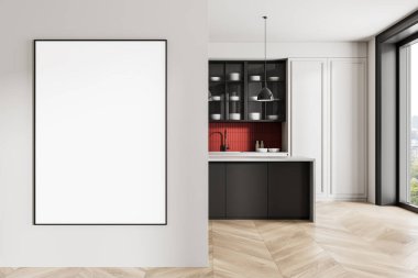 Beyaz duvarda çerçevelenmiş boş poster modeli modern mutfak içinin yanında kırmızı arka kaplama, ahşap zemin ve gün ışığı penceresi var. 3B Hazırlama