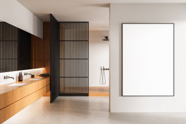 Minimalist banyo içinde temiz bir duvarda boş bir poster modeli, ahşap elementler, yumuşak ışıklandırma ve modern tasarım var. 3B Hazırlama