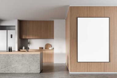 Temiz ahşap bir dolap ve ahşap bir duvarda büyük, dikey boş bir poster çerçevesi olan modern mutfak iç mimarisi. 3B Hazırlama