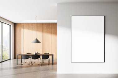 Modern yemek odasının iç kısımlarında ahşap paneller, açık beton zemin ve geniş pencereler olan temiz beyaz duvarda asılı boş bir poster modeli. 3B Hazırlama