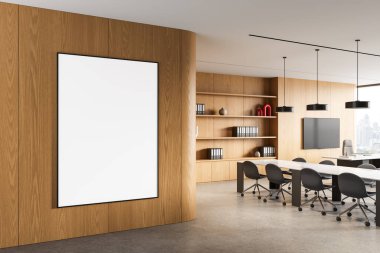 Modern parlak ofis içinde ahşap duvarda çerçevelenmiş boş poster modeli, en az dekor ve sunum konseptiyle temiz bir düzen. 3B Hazırlama