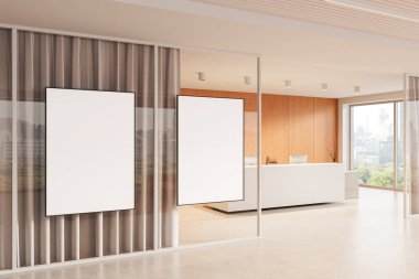 Modern ofis içi, ahşap resepsiyon masası, şehir manzarası ve doğal ışık olan cam duvarda boş dikey poster şablonları. 3B Hazırlama