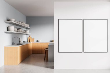 Minimalist mutfak içi ahşap dolaplar, açık raflar ve beyaz duvarda iki boş poster, modern tasarım modelleme şablonu. 3B Hazırlama
