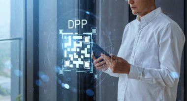 Man in white shirt holding tablet with glowing QR code and DPP text in tech hologram style, indoor setting, concept of digital product passport