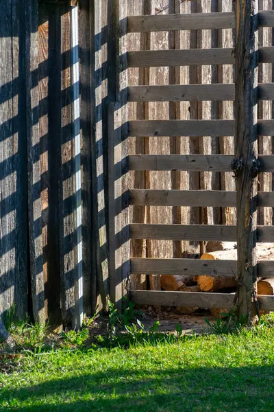 abstract shadow play from the wooden fence, interesting checkered texture, rhythm