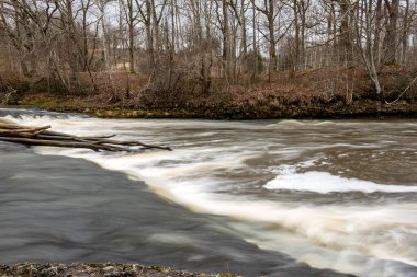 Abava Rumba is a multi-tiered waterfall on the Abava River, the water flows over dolomite steps, Abava Valley, Latvia