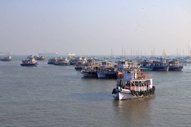 December 21 2022 - Mumbai, Maharashtra in India: Boats and Ferries near the Gateway of India