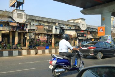 December 21 2022 - Mumbai, Maharashtra in India: chaotic Indian Street Traffic