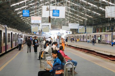 December 21 2022 - Mumbai, Maharashtra in India: Commuters using the local trains in Mumbai city
