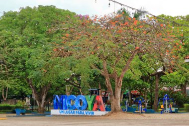 March 12 2023 - Nicoya, Guanacaste in Costa Rica: the green centre of a small village in Costa Rica clipart